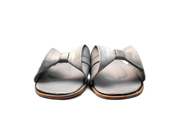 Grey women's sandals isolated on a white background.