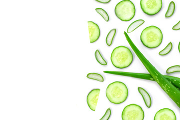 Wall Mural - Green fresh aloe vera and cucumber slices isolated on white background. Natural herbal medical plant ,skincare ,health and beauty spa concept. Top view. Flat lay.Space for text.