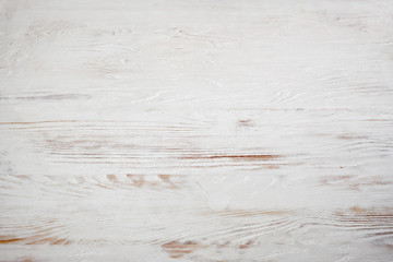  White painting on old wooden background