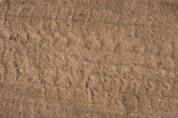 background  the texture of yellow sand is heterogeneous