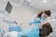 © Westend61 - Young woman getting dental treatment in clinic