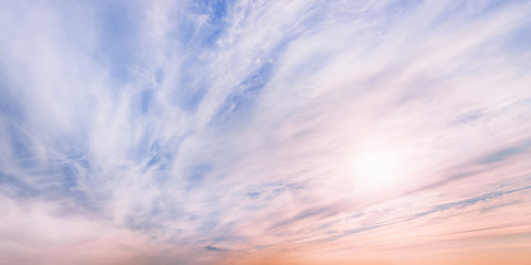 Wall Mural - large dramatic pastel colored cloudscape at sunset
