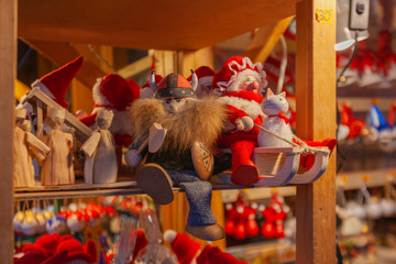 Canvas Print - Souvenir dolls stand on a shelf of a small store