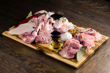 Poster - set of raw meat on a cutting board for grill