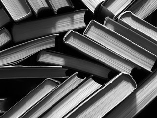 books on the bookshelf, the concept of reading and publishing, black and white photo