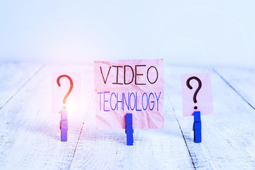 Fototapete - Handwriting text Video Technology. Conceptual photo recording and playing back of moving pictures and sound Scribbled and crumbling sheet with paper clips placed on the wooden table
