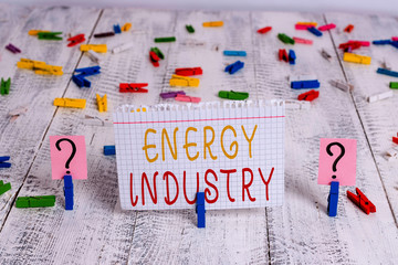 Poster - Word writing text Energy Industry. Business photo showcasing industries involved in the production and sale of energy Scribbled and crumbling sheet with paper clips placed on the wooden table