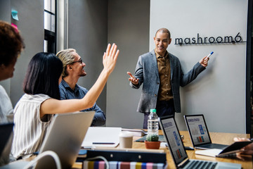 Wall Mural - Group of diverse people having a business meeting