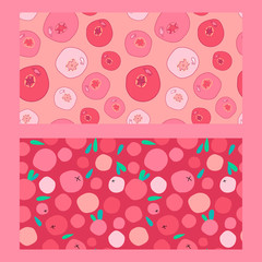 two seamless patterns with fresh lingonberries, cranberries and leaves on pink background