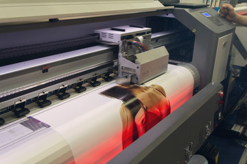 Wall Mural - large format printing machine in operation. industry