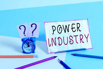 Poster - Text sign showing Power Industry. Business photo showcasing industries involved in the production and sale of energy Mini size alarm clock beside stationary placed tilted on pastel backdrop