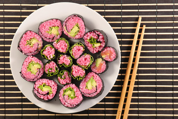 Canvas Print - vegetarian sushi in plate with chopsticks