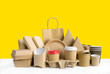Fast food packaging set on yellow background.