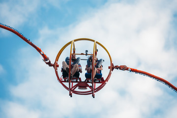 People having fun on a reversed bungee, also called slingshot ride.