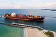 © Matteo Colombo - Aerial of cargo ship with containers entering the port of Miami
