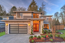 Modern Contemporary House Exterior With Luxury Details, Landscaping, Stone, Wood, Glass, Lots Of Large Windows.