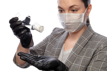 young woman on a white background in a medical mask