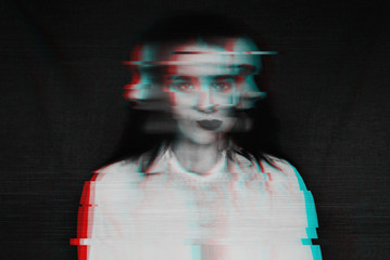 black and white blurred abstract portrait of a girl with mental disorders and schizophrenia with a glitch effect