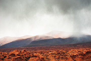 Wall Mural - Mountains in the desert during the rain. Plateau Altiplano, Bolivia. South America landscapes