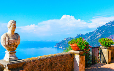 Wall Mural - Sculpture and flowers at terrace of Ravello village reflex