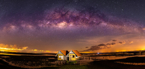 Wall Mural - the milky way (bridge over thale noi and twin houses, phatthalung province, thailand) on a clear cle