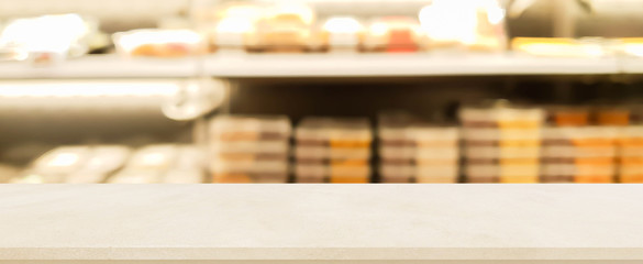 blur local supermarket in freshness food zone store background with cement perspective tabletop to showing product or ads banner and promote marketing on display concept	