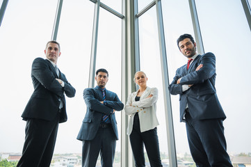 Group of Executive business people. Businessman and businesswoman standing in the meeting room.