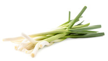 Young Green Garlic Closeup On A White. Isolated