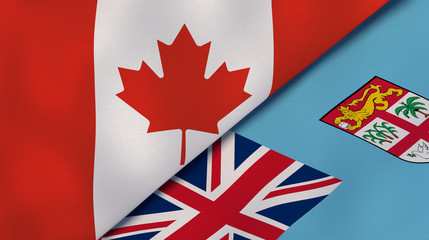 The flags of Canada and Fiji. News, reportage, business background. 3d illustration