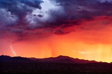 Wall Mural - sunset with monsoon storm clouds in the arizona desert