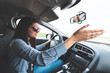 © blanke1973 - an angry young girl drives a car and points with her hands