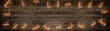 © Corri Seizinger - Silvester background panorama long - Firework on rustic brown wooden texture with space for text