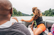 © Inti St. Clair - Dad and daughter on boat in lake surrounded by trees