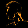 Man portrait silhouette in contrast backlight.