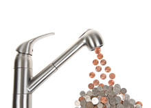 Kitchen Sink Faucet Isolated On White, Leaking Pennies, Which Cumulatively Add Up To Nickels And Dimes And Quarters Below. Concept, Cumulative Cost Of A Leaking Faucet.