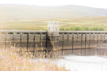 Loch Glascarnoch Dam In Highlands Of Scotland