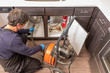 © spatesphoto - Professional Plumber Drain Cleaning