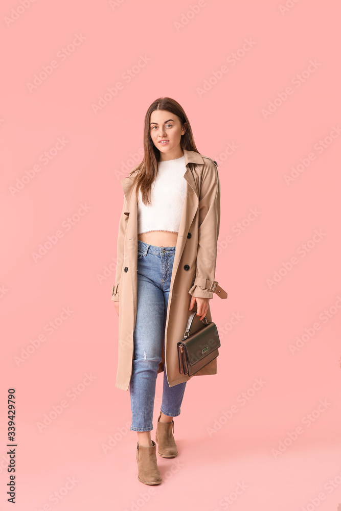 Beautiful young woman on color background