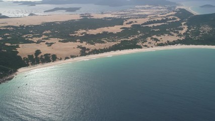 Wall Mural - Aerial of Na Beach at Dam Mon Peninsula, Van Phong Bay, Van Ninh, Khanh Hoa. is beautiful with its 10km untouched wilderness white sandy beach, crystal clear water, near most eastern point of Vietnam