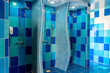 © rostovdriver - Public shower room with several showers