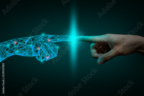Fotografía a human hand touching with digital hand, digital transformation concept