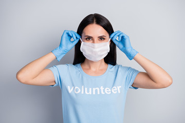 Canvas Print - Close-up portrait of her she nice attractive content girl medic doc voluntary putting mask on social service therapy preventive measures isolated over grey pastel color background