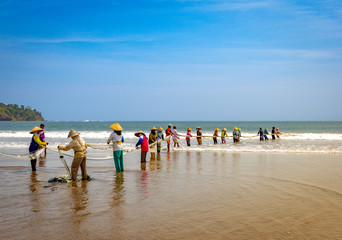 Traditional fishing on Pangandaran beach in Indonesia