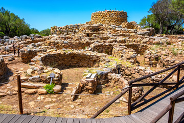 Arzachena, Sardinia, Italy - Archeological ruins of Nuragic complex La Prisgiona - Nuraghe La Prisgiona - with stone main tower and preserved remaining of Neolithic fortress