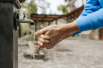 Hands of the woman. Correct method for washing hands.