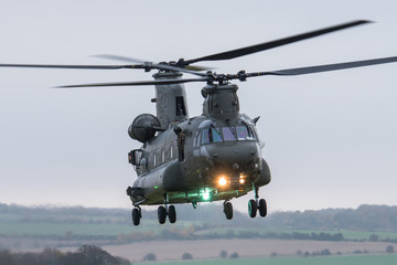 RAF Chinook helicopter on a training mission during Exercise Wessex Storm on Salisbury Plain Training Area, Wiltshire, UK