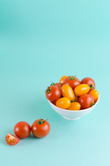 Wall Mural - Tomatoes in a bowl, foods concept image