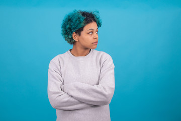 Wall Mural - afro american brunette girl isolated on color background