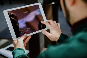 Man using digital tablet