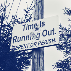 Wall Mural - Religious repent or perish sign on telephone pole